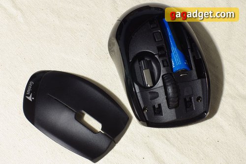 USB адаптер в отсеке для хранения под кожухом мышки